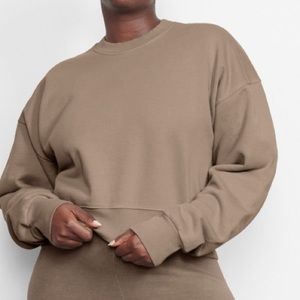 Skims outdoor fleece pullover desert color